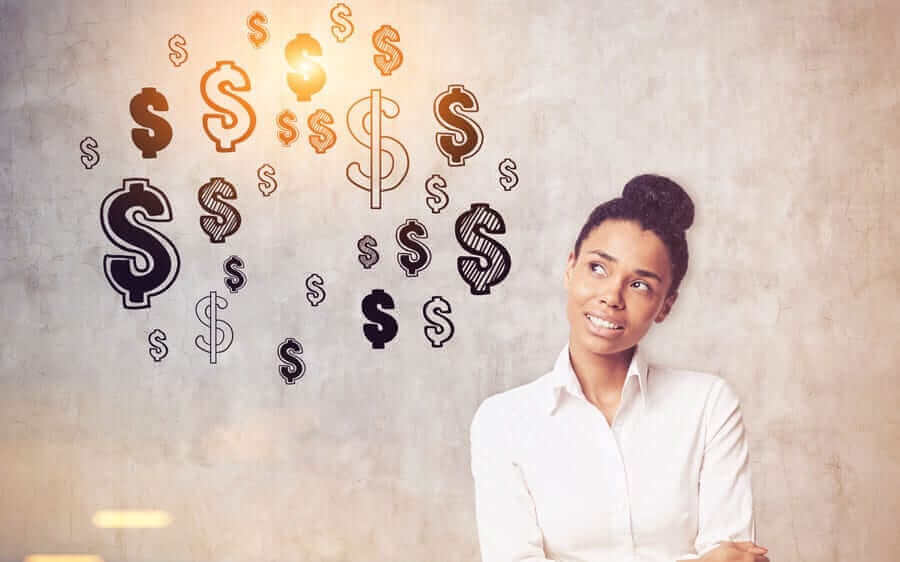 Woman looking confused at cartoon dollar signs floating next to her head