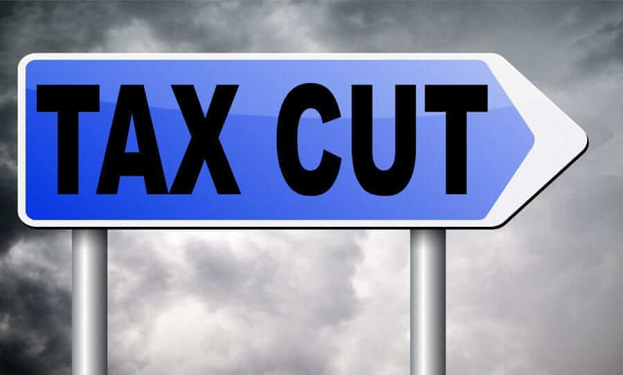 Road Sign with text that says "Tax Cut"