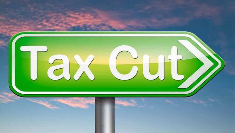 Road Sign Arrow with text that says "Tax Cut"