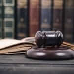 Judge Gavel in front of books