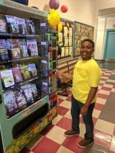 Kid at vending machine