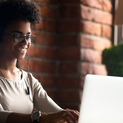 10 Free Online Learning Applications for Educators-Women working on computer